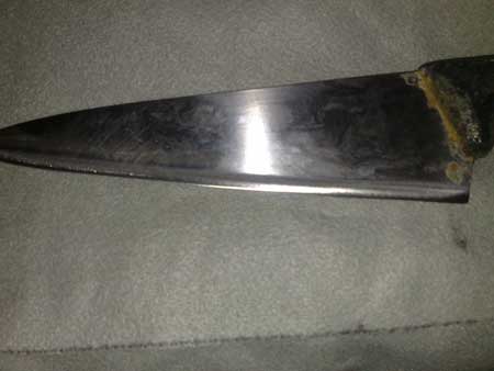 after image of severely damaged knife repaired