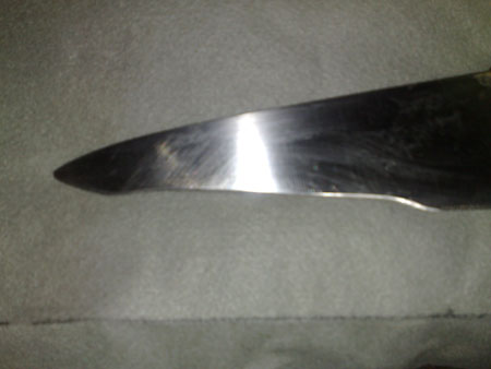 before image of severely damaged knife