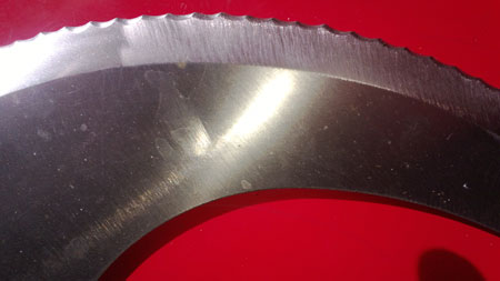 before image of medium pair of industrial serrated robo blades for a machine used fundamentally for chick pea blending