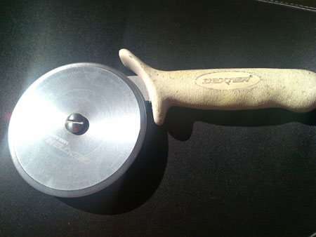 after image of pizza cutter sharpened