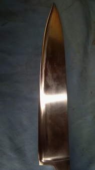 after image of knife with large chip repaired